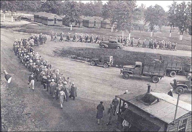 Prisoners marching through Camp Shelby