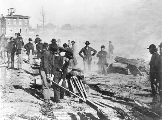 Confederates tearing up railroads