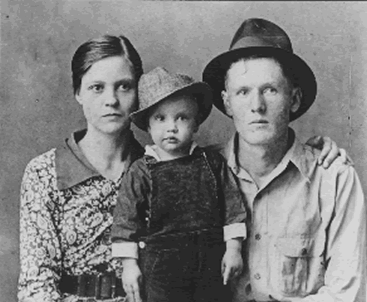 Baby Elvis with his parents